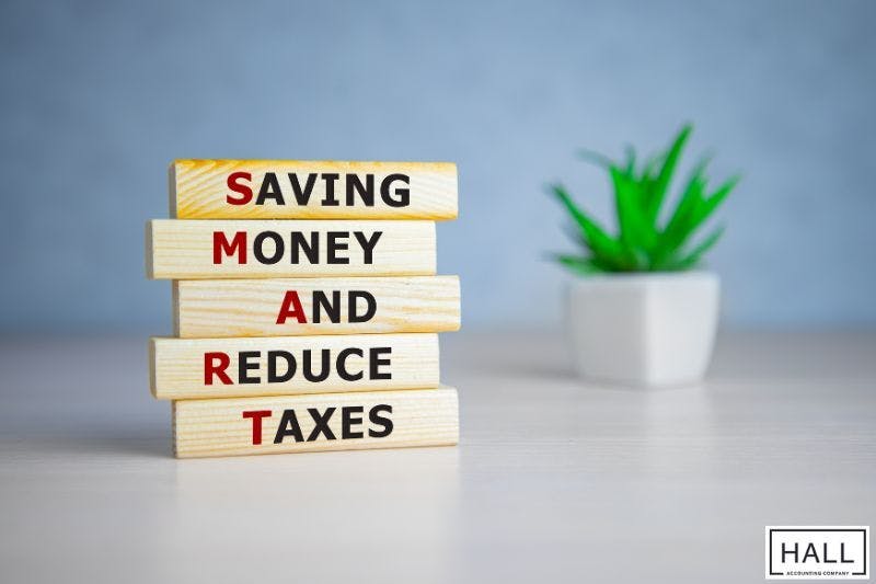 Wooden blocks stacked vertically display the acronym