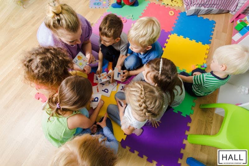 Children in daycare, representing dependent care benefits in