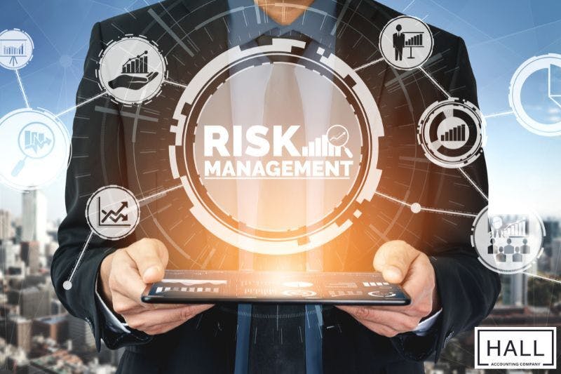 A person's holding a tablet that displays the text