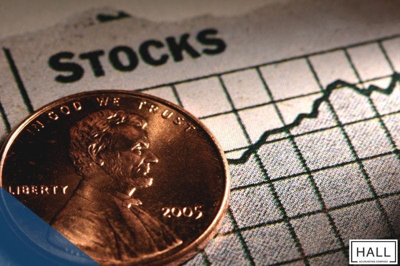 Close-up of a penny on a stock chart, representing financial growth