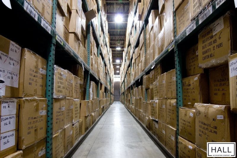 Warehouse full of inventory representing business impact of sales tax in San Antonio, Texas.