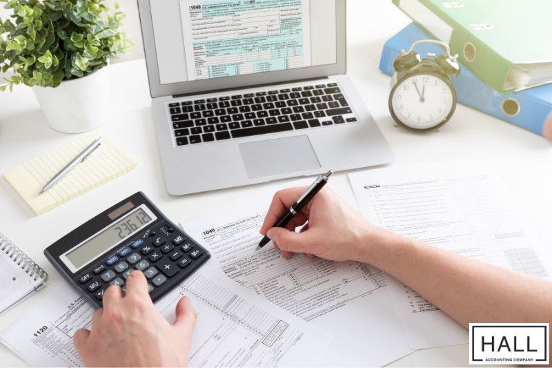 Business owner filling in tax forms