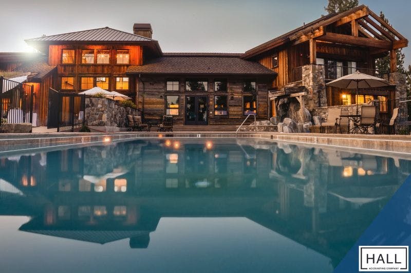 A luxurious estate with a pool highlights the importance of tax planning for high net worth individuals to protect assets