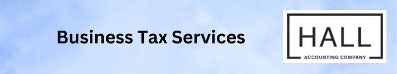 A blue colored banner with the words ‘Business Tax Services’