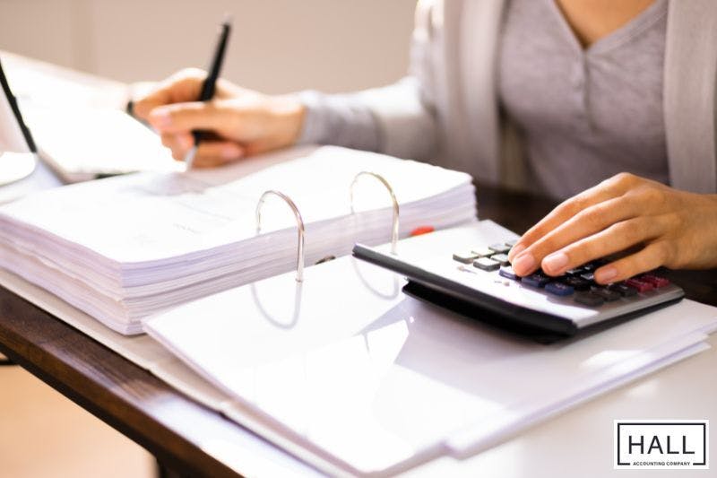 Business owner writing a response letter to the IRS